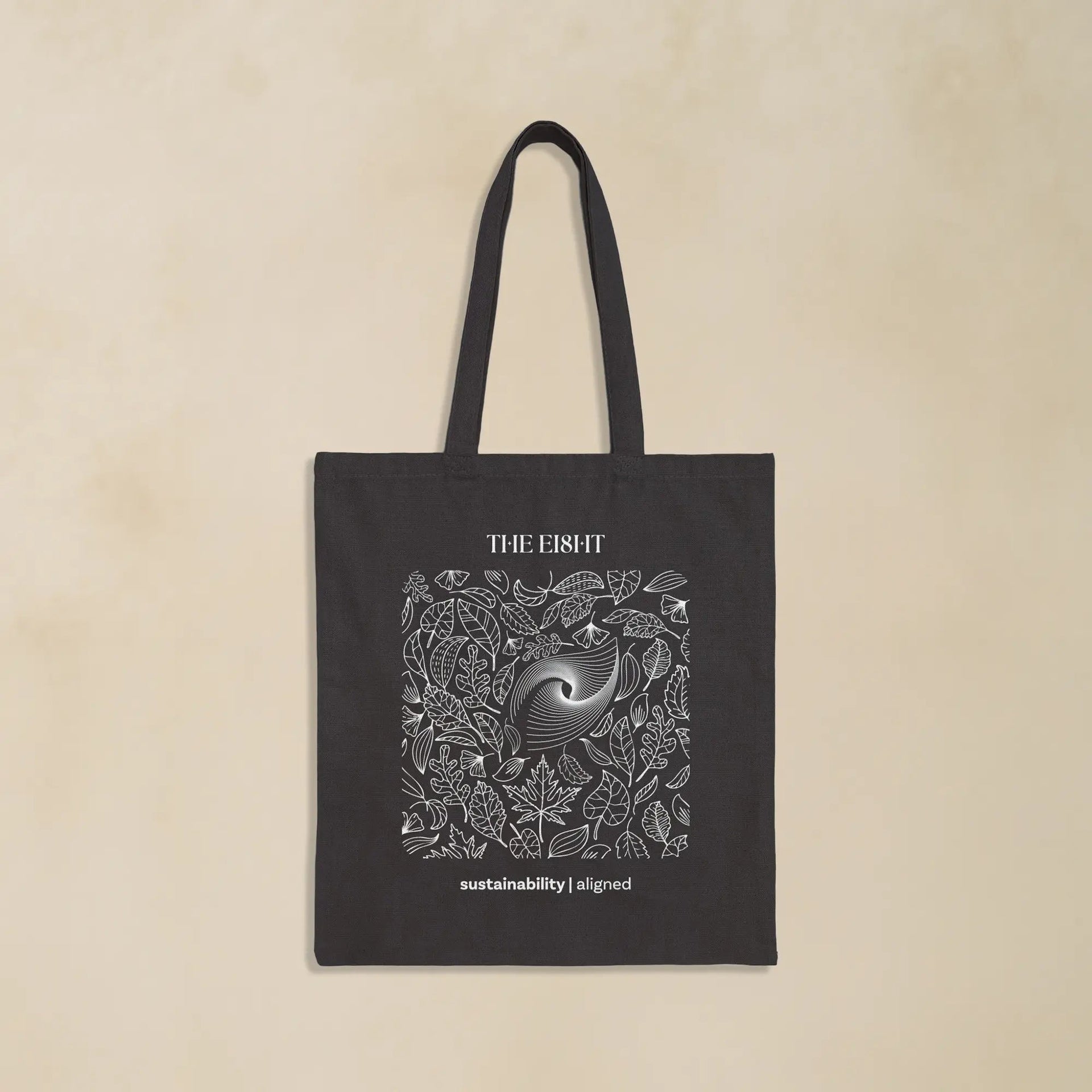 Sustainability Black Organic Cotton Tote - eco-friendly reusable bag with leaf and spiral design by the Ei8ht.