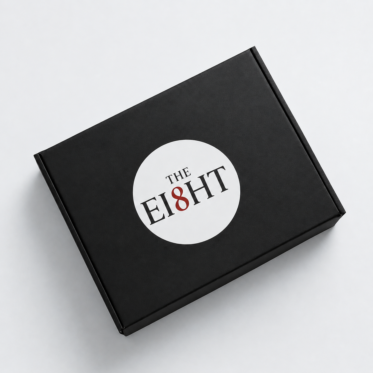 The Transition Set by The Ei8ht — black gift box with logo sticker.