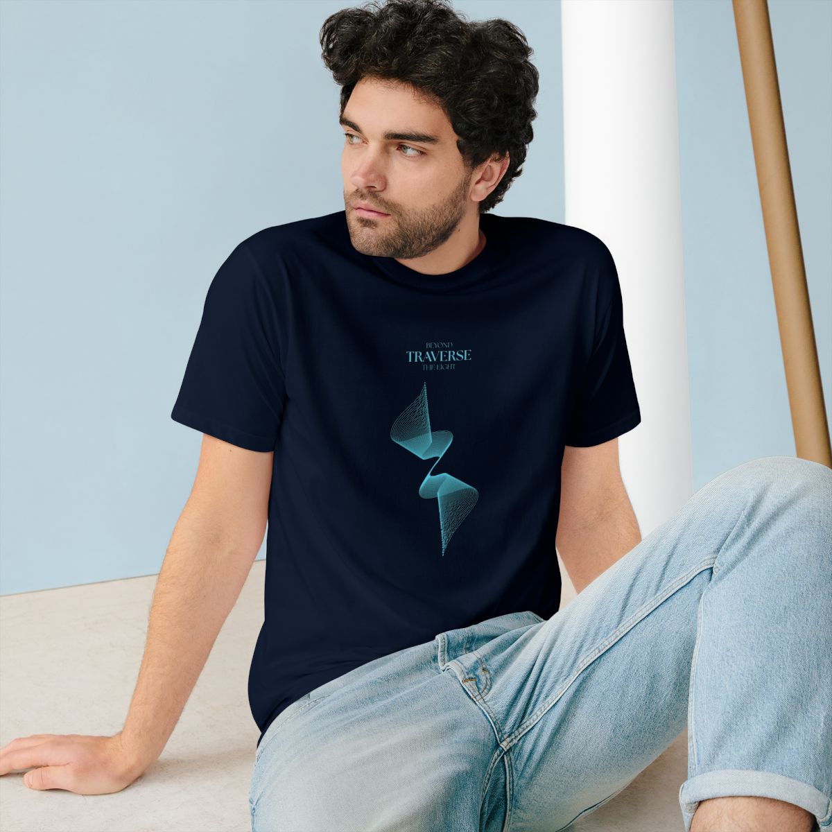 Man wearing navy 100% organic cotton Traverse T-shirt by The Ei8ht. - front view highlighting abstract sacred geometry for conscious, sustainable fashion.